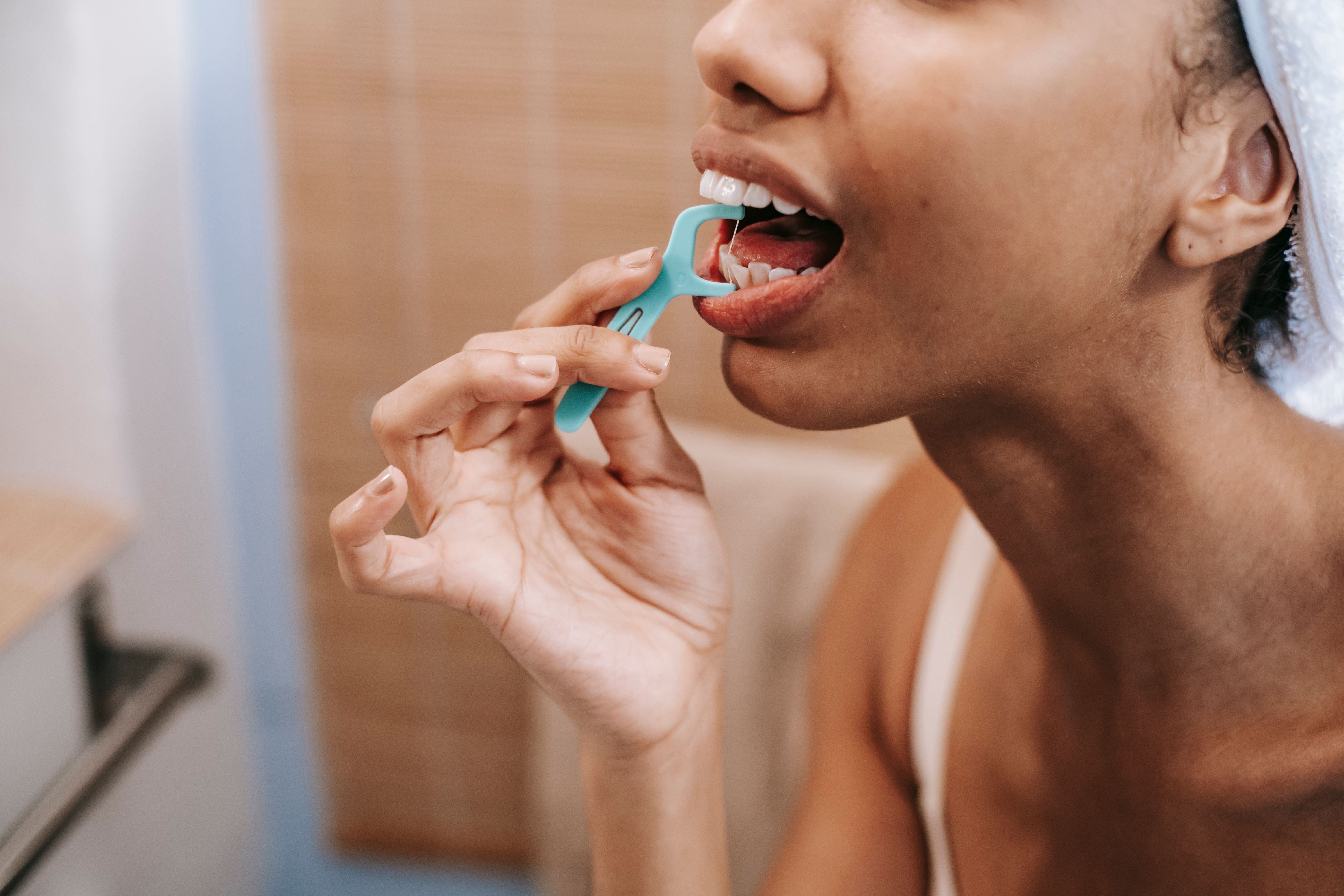 Why Does Food Keep Getting Stuck Between My Teeth? Causes and Fixes