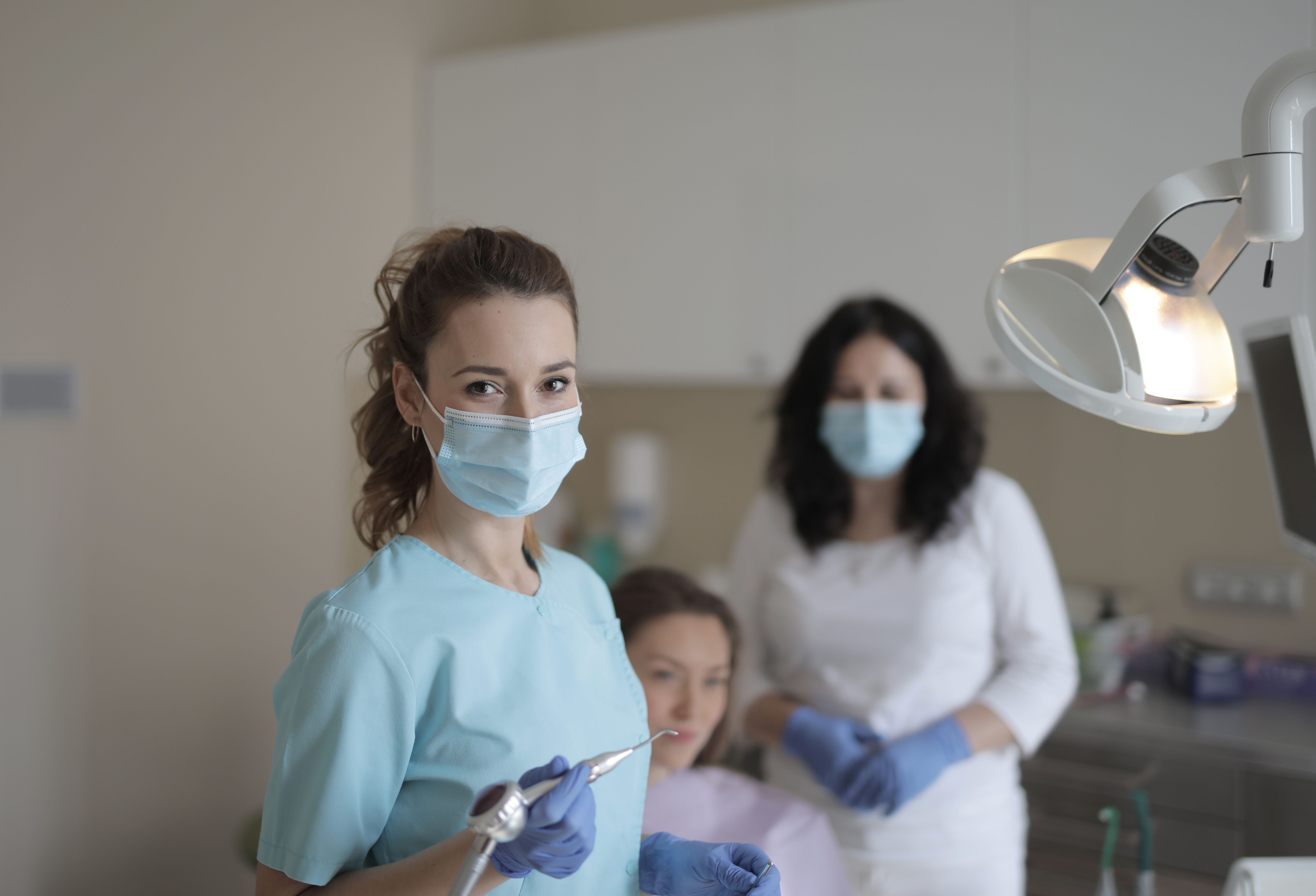 Dental Hygienist vs. Dental Assistant: Pay, Duties, Training